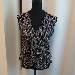 Black and White patterned sleeveless blouse